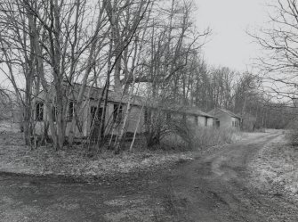 E/W Track. View of huts from NE