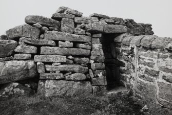 Surviving doorway in South West ruined wall at Dun Briste site, Isle of Berneray.