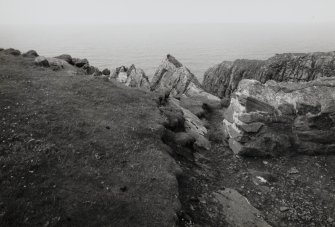 Edge of Dun Briste site on  cliffs edge, Isle of Berneray.