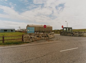 View of main entrance gate from SSW.