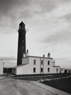 View from WSW of Principal Keeper's house and lighthouse tower, photo- survey 20-Aug-1992