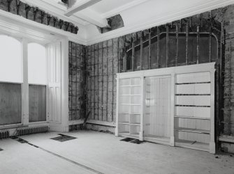 Interior. Ground floor, library, view from SW
