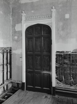 Interior. Ground floor, dining room, view of NE door and surround