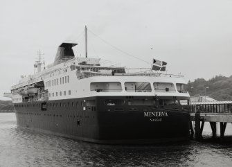 View from NE of Swan Helenic's cruise liner, 'Minerva', docked at the new terminal, which can handle both ferries and visiting cruise ships.  A portion of the new pier is just visible (right)