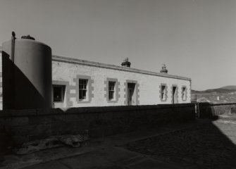 View from SE of keeper's house (W of the two blocks of dwellings, latterly a cafe, and may previously have housed engine house for fog-horn air compressors))