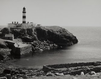 General view from NW of lighthouse complex and associated harbour