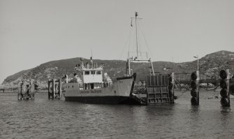 View from W of Isle of Rhum ferry moored at the Scalpay side, prior to moving into position to receive cars and foot passengers