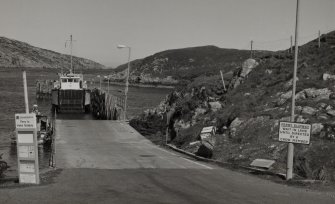 View from WSW of Isle of Rhum ferry receiving cars and passengers (on the Scalpay side)