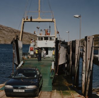 View from WSW of Isle of Rhum ferry receiving cars and passengers (on the Scalpay side)