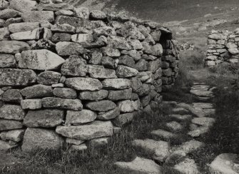 Blackhouse G.
View of East wall and pathway.