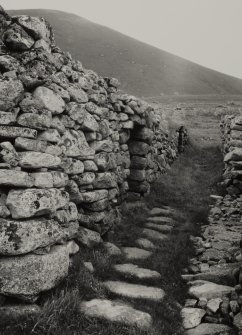 Blackhouse E.
View of East wall and pathway.