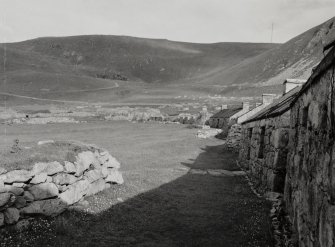 Village, Houses 12,13,14,15,16.
View from North East along street.