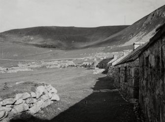 Village, Houses 12,13,14,15,16.
View from North East along street.