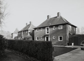 View from W of detached Officers' houses at SW end of Rosetrees Lane (NY 348 672)