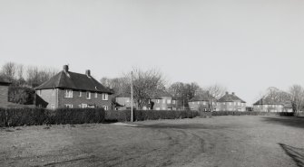 General view from SW of row of detached Officers' houses in Rosetrees Lane (NY 349 673)