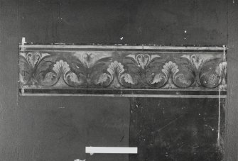 Interior. Nave, detail of revealed painted wall decoration on south wall.