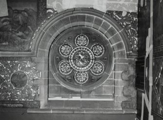 Interior. South chapel, stained glass window depicting the parable of the woman and the 10 coins.