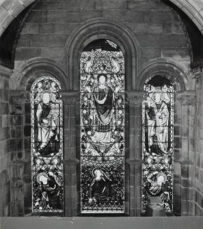 Interior. South chapel, stained glass window showing Christ with Moses and Elijah, the Transfiguration.
