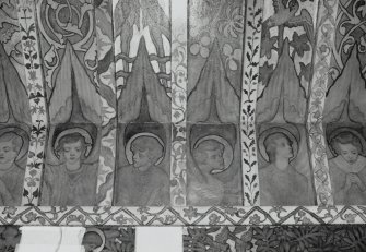 Interior. North chapel, detail of mural frieze depicting heads of angels.