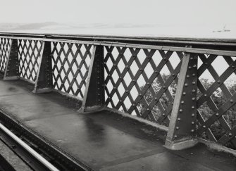 Detail of the latticed steel bridge parapet on the South approach viaduct.