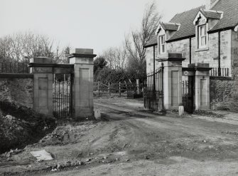 Edinburgh, Edmonstone House, East Gate Lodge.
View from East showing entrance gateway.