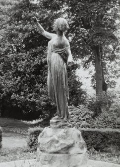 Statue of girl by Pilkington Jackson, to South West of main house, view from West.