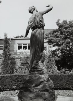 Statue of girl by Pilkington Jackson, to South West of main house, view from South.