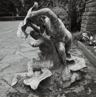 Lead sculpture by Charles Mackie in garden to South of main house, view from East.