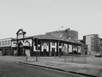 View of rounded corner with Semple Street from SE