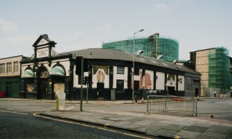 View of rounded corner with Semple Street from SE