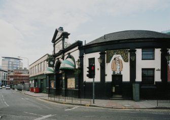 View of rounded corner and front from E