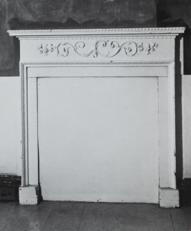 Interior view of a fireplace in the North East room on the first floor.