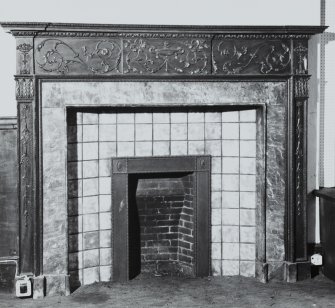 Ground floor, South West apartment, West wall chimneypiece