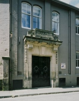 View of doorway with NB Rubber Company sign above.