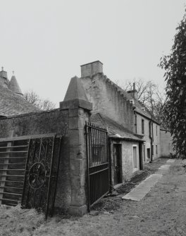 View of gates and cottage wing from N