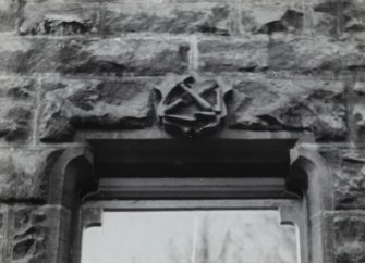 Dunrobin Place.
Detail of upper shield on gable end showing slater's insignia.