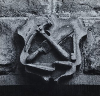 Dunrobin Place.
Detail of upper shield on gable end showing slater's insignia.