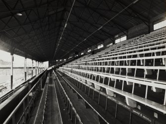 View of interior of main east stand from south