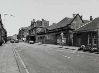 Henderson Row, Tram Depot.
General view of street front from West with wash house in foreground.