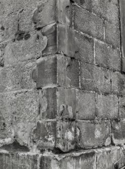 Detail of shaped quoins at junction of South and East walls