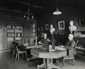 Interior-general view of one of the rooms, with Mr John Grant and Mr James Thin seated at tables