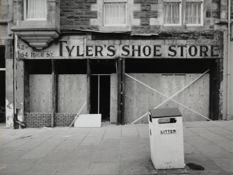 Detail of shop front for Tyler's Shoe Store exposed during renovations in May 1992