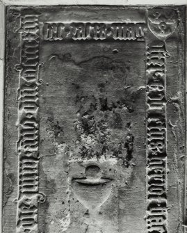 Edinburgh, Kirk Loan, Corstorphine Parish Church, interior.
View of a rectangular graveslab, with marginal inscription, with a central motif of the chalice and wafer.