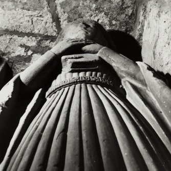 Edinburgh, Kirk Loan, Corstorphine Parish Church, interior.
Detail of the effigy of the lady from Sir John Forrester's tomb, 1440. View looking from feet to head, showing the lady resting her hands on a book.