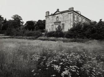 General view of house and garden from South-East.