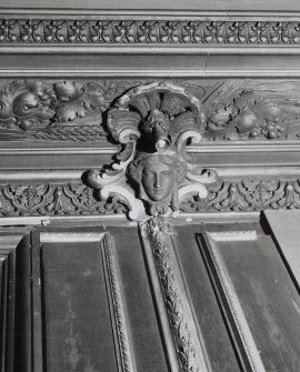 Interior-detail of one of a few plasterwork heads on cornice in Room G.14