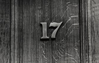 Detail of No 17 door number;  3" numeral, solid