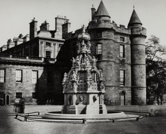 General view of South East corner of Holyrood Palace, with Fountain in foreground