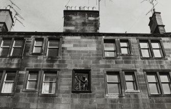 Edinburgh, 73-91 Holyrood Road.
View of upper building showing sculptured panel.