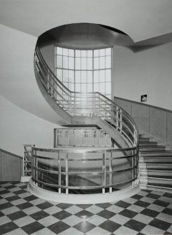 Interior. View of E circular staircase from SE